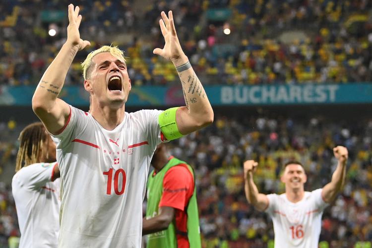 Schweiz skabte med Granit Xhaka som anfører den helt store sensation ved at sende frankrig ud af EM efter straffesparkskonkurrence. Foto: Justin Setterfield/Ritzau Scanpix