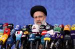 Irans præsident Ebrahim Raisi taler på en pressekonference i Tehran.  Mens der er fornyede diskussioner om atomaftalen mellem USA og Iran, lyder det nu fra Joe Biden, at så længe han sidder som amerikansk præsident, skal Iran ikke regne med at få atomvåben. Foto: Wana News Agency/Ritzau Scanpix