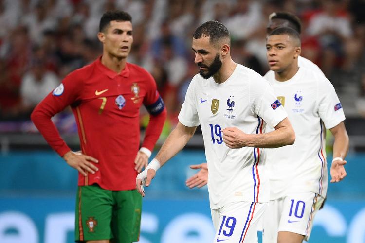 Cristiano Ronaldo samt Karim Benzema og  Kylian Mbappe er færdige ved EM, hvor Ronaldo fortsat kan nå at blive topscorer.   Foto: Franck Fife/Ritzau Scanpix