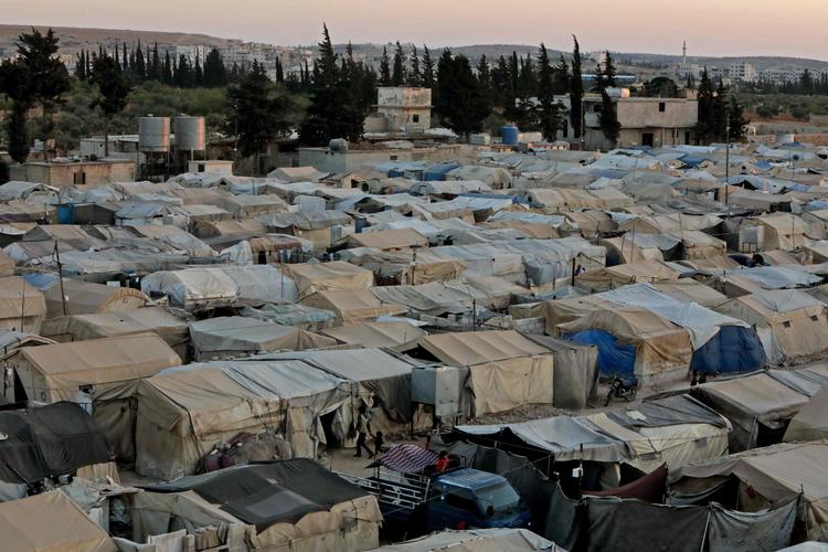 Lejr for internt fordrevne i det oprørskontrollerede nordvestlige Syrien. Nu truer Rusland med at blokere for hjælp til området uden om Bashar al-Assads diktatur.
     Foto: Bakr Alkasem/Ritzau Scanpix