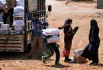 Nødhjælp til den syriske Idlib-provins. FN har godkendt hjælp direkte fra Tyrkiet. I andre provinser kontrollerer Assad-diktaturet, hvem der skal have hjælp.
 Foto: Khalil Ashawi/Ritzau Scanpix