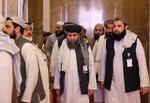 Medlemmer af Taleban ankommer til fredsforhandlinger med den afghanske regering i går i Qatars hovedstad, Doha.  Foto: Karim Jaafar/Ritzau Scanpix