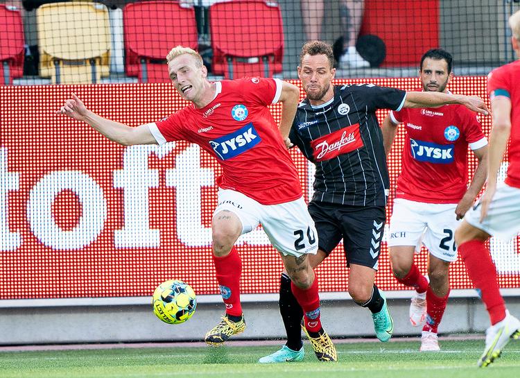 Tobias Salquist (tv.) var en af de Silkeborgspillere, der sammen med træner Kent Nielsen fik comeback i Superligaen. Foto: Henning Bagger/Ritzau Scanpix