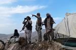 Afghanske soldater fotograferet i sidste uge, hvor de spejdede efter Taleban.  Foto: Farshad Usyan/Ritzau Scanpix