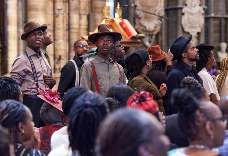  Unge fra teatergruppen  The Hebe Foundation charity markerer The Windrush Generation om de jamaicanere, der efter årtier i Storbritannien blev frataget alle rettigheder. Udvisningerne af de unge krimielle til et land, de ikke kender, minder briterne om den tragedie. Foto: Niklas Halle'n/Ritzau Scanpix