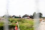     Der arbejdes fortsat på Amager Fælled-byggepladsen trods afgørelser fra Miljøklagenævnet og Planklagenævnet. Klagekoret sang foran indgangen til byggeriet fra kl. 16 til 17.   Foto: Nanna Navntoft