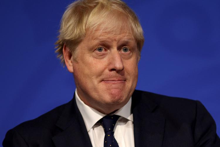 Boris Johnson holdt tirsdag pressemøde om den britiske coronastrategi. Foto: Dan Kitwood/Ritzau Scanpix