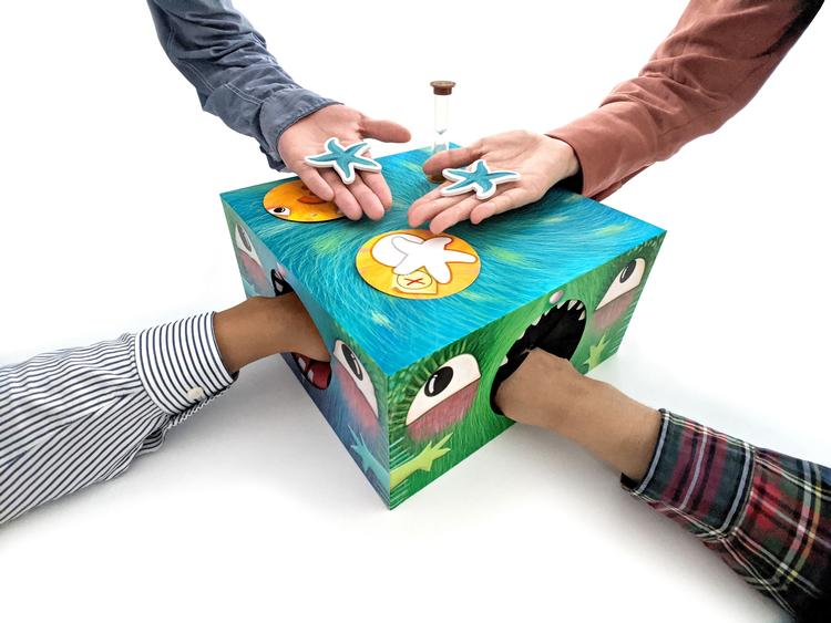 Monsteret har spist for meget, og nu skal du fiske alt fra chokolade til mobiltelefoner ud af dets gab. Sådan foregår spillet 'Box Monster', der er nomineret til Årets Børnespil 2021.  