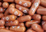 FILE PHOTO: An experimental COVID-19 treatment pill, called molnupiravir and being developed by Merck &amp; Co Inc and Ridgeback Biotherapeutics LP, is seen in this undated handout photo released by Merck &amp; Co Inc and obtained by Reuters May 17, 2021. Merck &amp; Co Inc/Handout via REUTERS ATTENTION EDITORS - THIS IMAGE HAS BEEN SUPPLIED BY A THIRD PARTY. MANDATORY CREDIT. THIS IMAGE WAS PROCESSED BY REUTERS TO ENHANCE QUALITY, AN UNPROCESSED VERSION HAS BEEN PROVIDED SEPARATELY./File Photo Foto: Merck & Co Inc/Ritzau Scanpix
