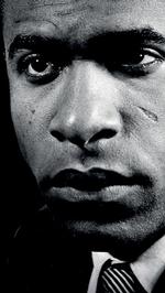 Frantz Fanon var læge, forfatter, psykiater, filosof og frihedskæmper, født i Martinique i 1925. Han udgav 'Fordømte her på jorden' i 1961 og døde samme år.  Foto: Udsnit af bogforside