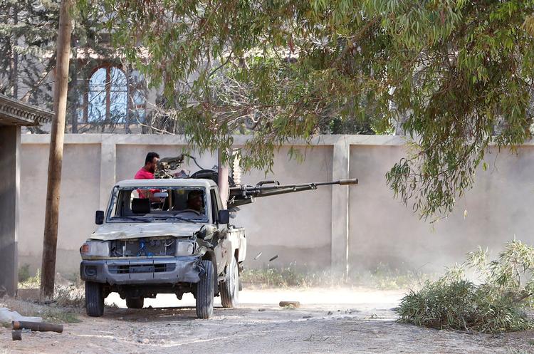 Krydsild i Tripoli - den 24. december skal borgerkrig erstattes af et parlamentsvalg.
 Foto: Ismail Zitouny/Ritzau Scanpix