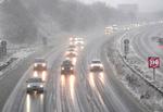 Snevejr i trekantsområdet i Jylland tidligere i dag. Her på motorvejen ved Den Nye Lillebæltsbro. Foto: Claus Fisker/Ritzau Scanpix