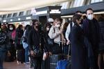 Rejsende venter på at tjekke ind i Dulles Internationale Lufthavn i Virginia i USA i går.  Foto: Anna Moneymaker/Ritzau Scanpix