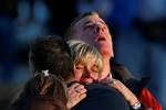 Lynn og Christopher McDonnell, forældrene til syv-årige Grace Mcdonnell, i sorg efter de har fundet ud af, at deres datter er blevet dræbt. (REUTERS/Adrees Latif) Foto: Adrees Latif/Ritzau Scanpix