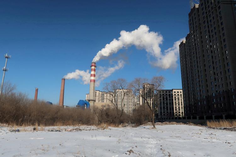 De kinesiske kulkraftværker som dette i Harbin fyrede sidste år ekstra op under kedlerne for at levere strøm til den økonomiske vækst. Det kan mærkes på nye klimatal.  Foto: Muyu Xu/Ritzau Scanpix