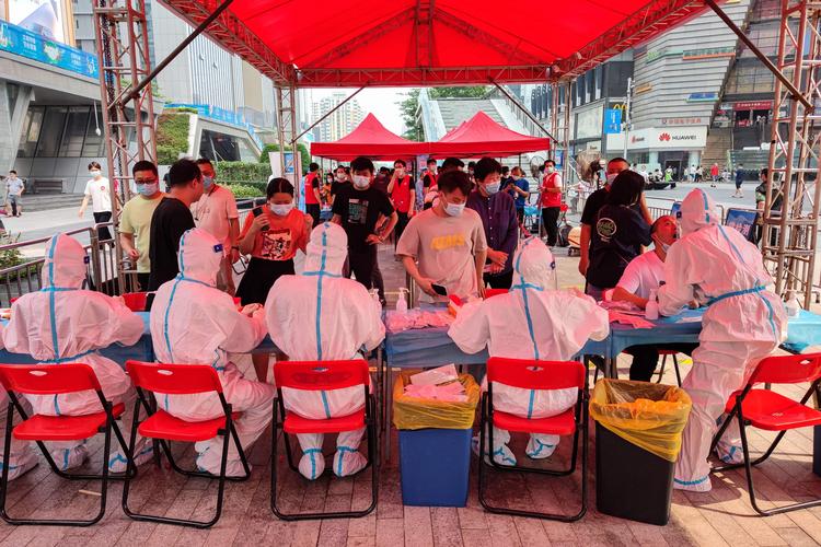 Beboere i Shenzhen fotograferet i juni sidste år.  Foto: Str/Ritzau Scanpix