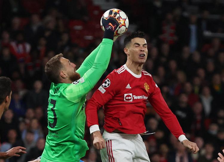 Målmanden Jan Oblak (tv.) stoppede alt, hvad der blev sendt mod Atléticos mål, og så er Cristiano Ronaldo (th.) ude af den turnering, han har vundet fem gange. Foto: Phil Noble/Ritzau Scanpix