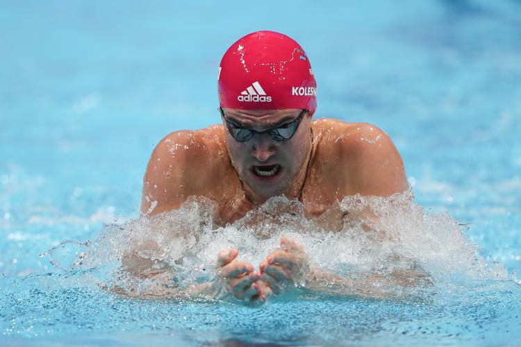 En af Ruslands store svømmestjerner Kliment Kolesnikov fotograferet ved VM i svømning i Abu Dhabi i december.  Foto: Kamran Jebreili/Ritzau Scanpix