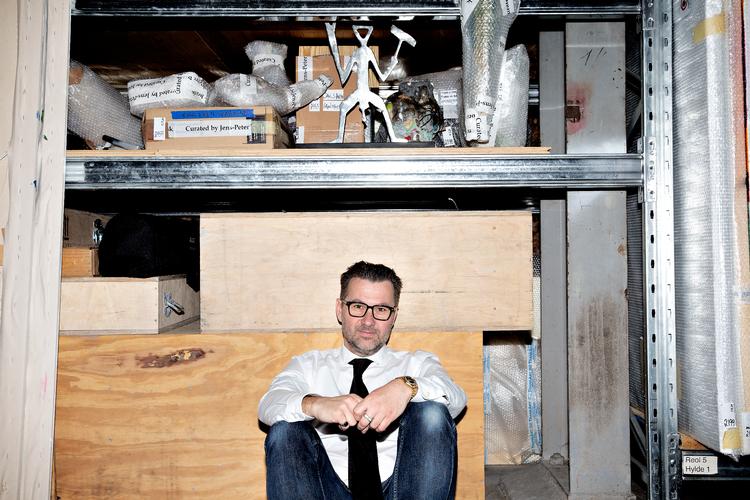 Jens-Peter Brask blandt sine værker i lageret på Refshaleøen. Foto: Martin Lehmann