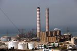 Kraftværket ved Zouk i Libanon er med til at gøre den nærliggende storby Jounieh til en af de mest forurenede i Mellemøsten. Det er bygget med milliardstøtte fra den danske stat, på trods af at det er særdeles klimaskadeligt. Foto: Hussein Malla/Ritzau Scanpix