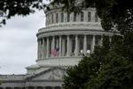 WASHINGTON, DC - MAY 12: The U.S. flag flies at half staff over the U.S. Capitol Building on May 12, 2022 in Washington, DC. U.S. President Joe Biden ordered flags around the country to be flown at half staff to honor the one million American lives lost to COVID-19. Anna Moneymaker/Getty Images/AFP == FOR NEWSPAPERS, INTERNET, TELCOS &amp; TELEVISION USE ONLY == Foto: Anna Moneymaker/Ritzau Scanpix