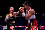 Boxing - Amanda Serrano v Sarah Mahfoud - IBF, IBO, WBC &amp; WBO World Featherweight Titles - AO Arena, Manchester, Britain- September 24, 2022 Amanda Serrano in action with Sarah Mahfoud Action Images via Reuters/Andrew Couldridge Foto: Andrew Couldridge/Ritzau Scanpix