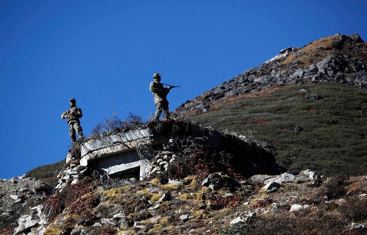 Siden krigen i 1962 har både kinesiske og indiske tropper forsvaret deres positioner på den bjergrige grænsestrækning i Himalaya-regionen.  Foto: Anupam Nath/Ritzau Scanpix
