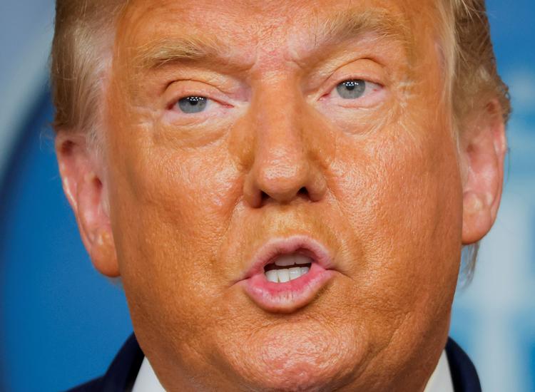 Tidligere præsident Donald Trump risikerer at miste rettigheden til at stille op til et offentligt embede, hvis det amerikanske justitsministerium vælger at følge kongresudvalgets opfordninger til at retsforfølge ham. Foto: Carlos Barria/Ritzau Scanpix