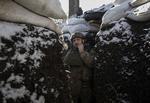 Ukrainsk soldat i en skyttegrav ved fronten i Donetsk. 7. januar 2023.   Foto: Stringer/Ritzau Scanpix