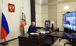 Putins møde med sine ministre skete via videoforbindelse til hans officielle bolig uden for Moskva. Foto: Mikhail Klimentyev/Ritzau Scanpix