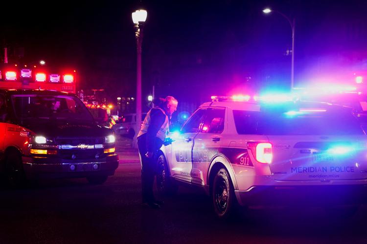Politiet er massivt til stede ved Michigan State University, hvor tre personer er blevet dræbt af skud. Den formodede gerningsmand er blevet fundet død. Ifølge politiet har han skudt sig selv. Foto: Dieu-nalio Chery/Ritzau Scanpix
