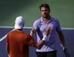 Stanislas Wawrinka siger tak for kampen til Holger Rune efter sin sejr i Indian Wells. Foto: Harry How/Ritzau Scanpix