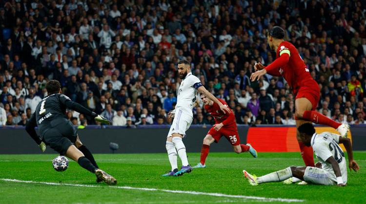 Med denne stilfærdige inderside blev Karim Benzema matchvinder mod Liverpool.  Foto: Susana Vera/Ritzau Scanpix