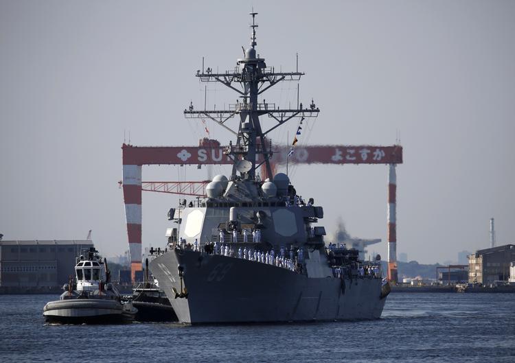 Krigsskibet 'USS Milius', der her ses lægge til ved en amerikansk flådebase i Yokohama i Japan i 2018, skulle ifølge Kina være blevet drevet ud af kinesisk farvand. USA afviser, at det er tilfældet. Foto: Issei Kato/Ritzau Scanpix