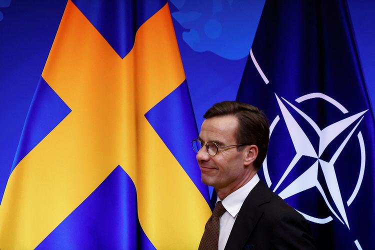 Sveriges statsminister, Ulf Kristersson, kæmper for at få godkendt landets medlemskab af Nato, som lige nu blokeres af både Tyrkiet og Ungarn. Foto: Yves Herman/Ritzau Scanpix