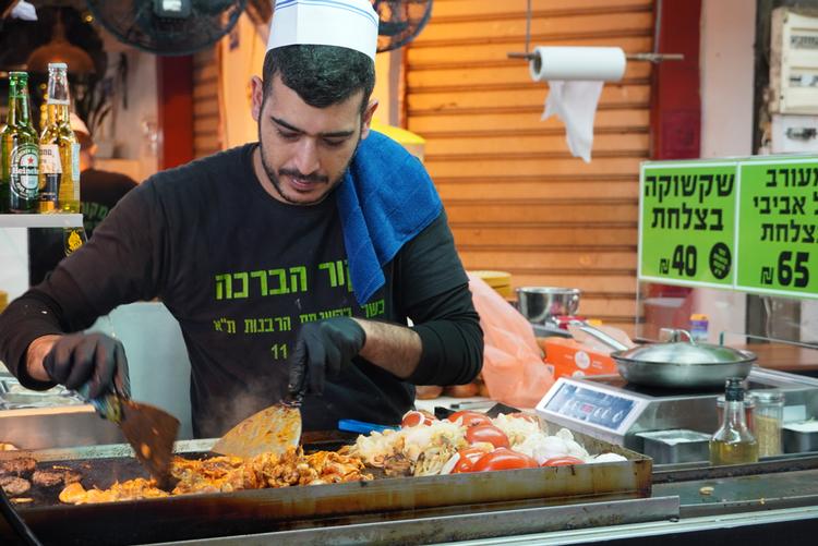 Carmel-markedet i Tel Aviv er et mødested for israelere af alle slags anskuelser. Foto: Jotam Confino
