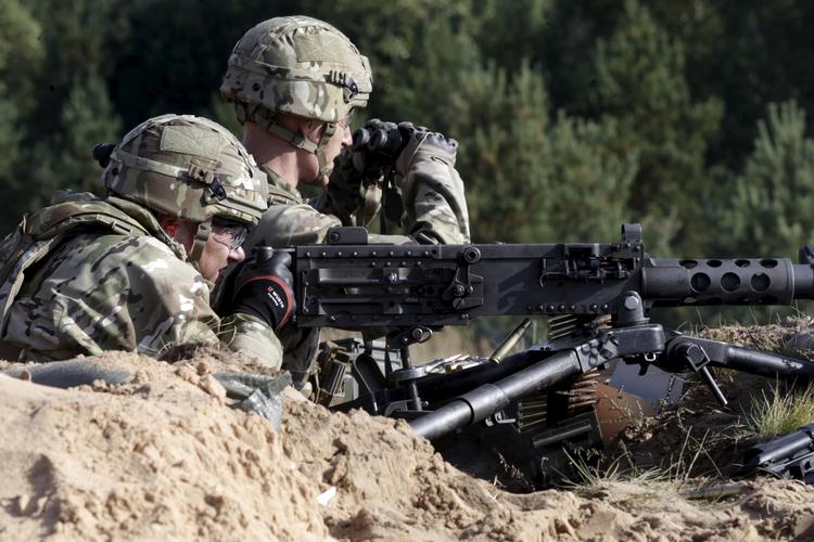 Danske soldater under en Nato-øvelse i Letland i 2015.  Foto: Ints Kalnins/Ritzau Scanpix