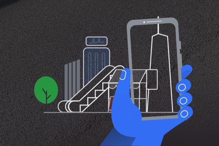 Når man har trykket på 'livevisning', skal man lade sin telefon skanne bygningerne i nærheden.  Screendump Google Maps Livevisning