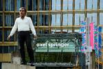 Det er mediekoncernen Axel Springer SE, der har meldt den store sparerunde ud.  Foto: Ina Fassbender/Ritzau Scanpix
