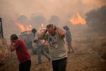 Den græske ø Rhodos har denne sommer været plaget af ekstrem varme og en række voldsomme skovbrande.  Foto: Angelos Tzortzinis/Ritzau Scanpix