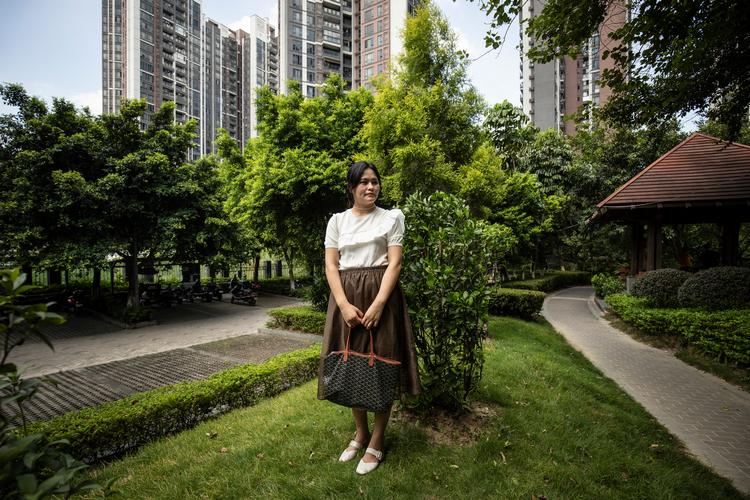 Guo Miaomiao udnyttede de lavere boligpriser og renter til at købe sig en lejlighed i Guangzhou i det sydlige Kina. Hun er en blandt et stigende antal ugifte kvinder i Kina, der køber deres egen bolig. (Qilai Shen/The New York Times) Foto: Qilai Shen/Ritzau Scanpix