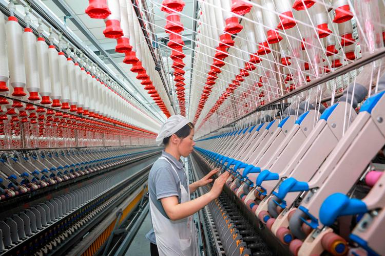 Genåbningen af Kina efter coronakrisen er en stor del af forklaringen på, at OECD opjusterer forventningen til den økonomiske vækst i verden. Foto: Str/Ritzau Scanpix