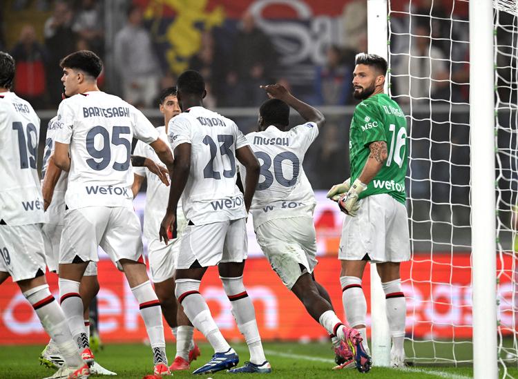 Olivier Giroud nåede at komme i aktion imellem stængerne, da AC Milans målmand havde fået rødt kort, og alle udskiftninger var brugt. Giroud holdt buret rent.    Foto: Daniele Mascolo/Ritzau Scanpix