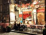 Man kan ikke gå et skridt i Napoli (og i regionens byer i det hele taget) uden at støde på et pizzeria, og bordene står tit tæt pakket på fortovene. Du spiser i de gamle gyder pyntet med skilte og flag, som fejrer byens fodboldholdhelte. Foto: Maria Cristina Castellucci
