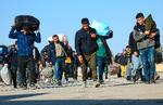 Afghanere, der er udvist fra Iran, fotograferet ved Islam Qala-grænseovergangen. Foto: Mohsen Karimi/Ritzau Scanpix