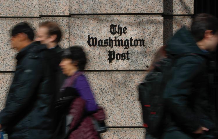 Washington Post har undskyld til sin læsere, efter at avisen bragte det som af flere blev set som en 'racistisk' tegning. Foto: Pablo Martinez Monsivais/Ritzau Scanpix