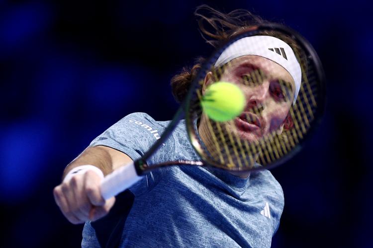 Stefanos Tsitsipas i aktion, inden han trak sig. Foto: Guglielmo Mangiapane/Ritzau Scanpix