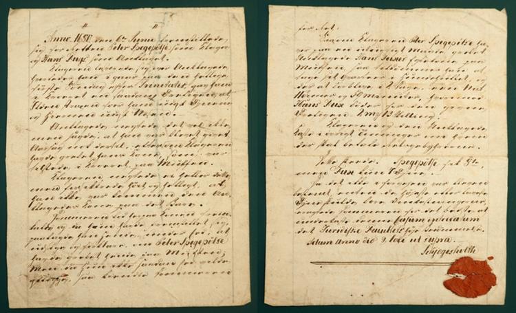 For- og bagsiden af det sælsomme dokument om retssagen mellem Peter Spegepølse og Hans Fux findes i Rigsarkivet. Foto: Kenn Tarbensen