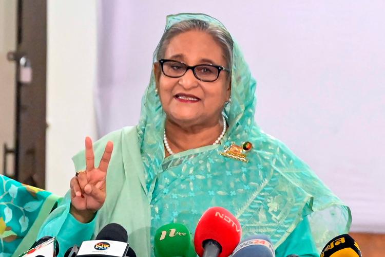  Sheikh Hasina fotograferet, da hun afgav sin stemme tidligere søndag i Dhaka.  Foto: -/Ritzau Scanpix