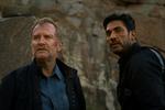 Ulrich Thomsen og Afshin Firouzi som Carl Mørck og Assad på en baggrund af et bornholmsk klippeparti. Foto: Nordisk Film Production